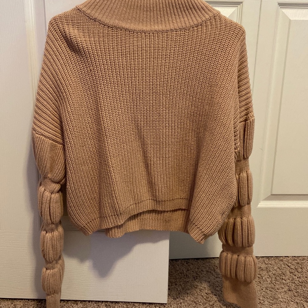 Women’s crop mock neck balloon sleeve tan sweater.
